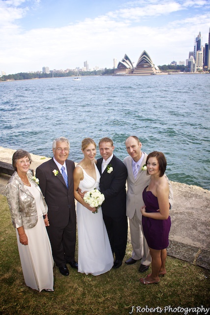 Bride and groom with family, sydney harbour foreshore - wedding photography